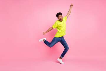 Full length body size view of nice attractive best cheerful guy dancing celebrating isolated over pink pastel color background