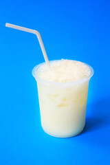 Healthy fresh white smoothie or milkshake. Summer cold drink. cocktails with coconut milk or almond milk