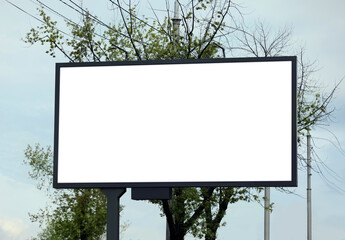 Blank advertising board in city. Mockup for design