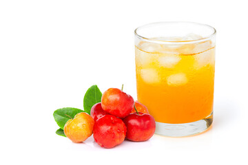 Acerola cherry berry fruit with green leaf and glass of acerola juice