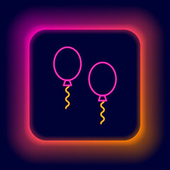 Glowing neon line Balloons with ribbons icon isolated on black background. Colorful outline concept. Vector