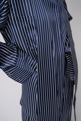 blue shirt with a tie