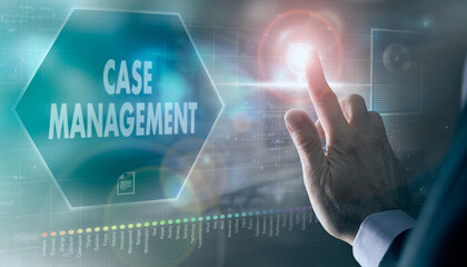 A businessman controlling a futuristic display with a Case Management business concept on it.