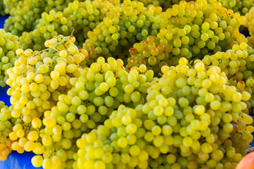 ANTALYA, TURKEY: Sale of grapes in a street market. Grocery traditional Turkish bazaar in Antalya.