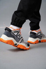 Obraz premium person in sports pants and sneakers