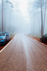 wet mountain road and poor visibility