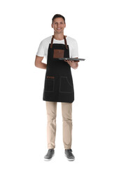 Full length portrait of happy young waiter with tray on white background