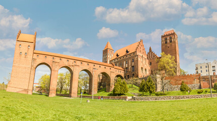 Fototapeta na wymiar Kwidzyn, Poland - built in 1233 and a fine example of Teutonic Knights' castles architecture, the Kwidzyn Castle is famous for its red brick and unusual shape