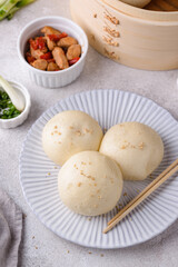 Chinese steamed buns baozi with steamer