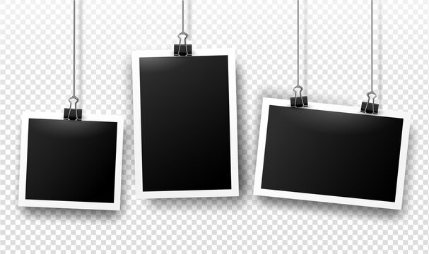 Photo frames hanging on binder clips with shadows. Vector templates set for editing. Realistic illustration of empty photo isolated on transparent gray background.