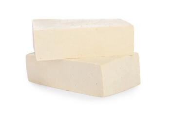 Blocks of delicious raw tofu on white background