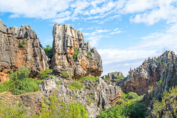 Fototapeta premium The Iron Hill eroded landscape of some old abandoned mines in North Seville Mountains, Andalusia, Spain