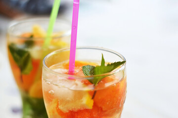 Orange soda non-alcoholic drink with mint closeup