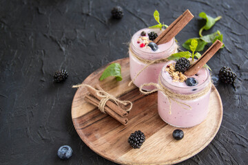 Healthy smoothie of fresh summer berries. Creative atmospheric decoration