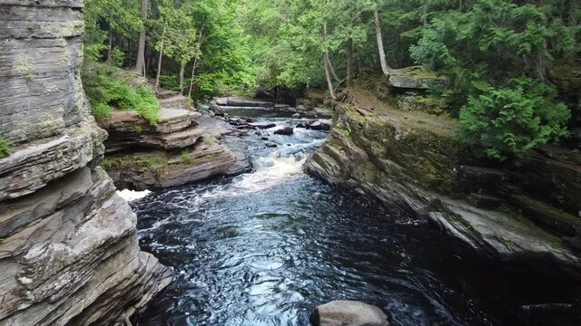 Aerial of majestic waterfalls in Michigan