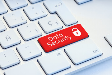Fototapeta premium Cyber Security word and padlock icon on red computer keyboard