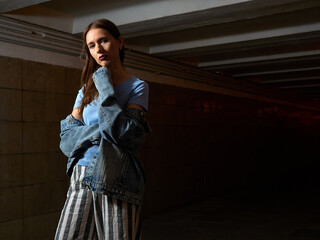 Lonely girl in the underpass