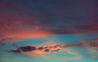 Vibrant looking fiery cloudscape during sunset. Photo taken during a monsoon evening in Kolkata, West Bengal.