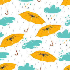Fototapeta na wymiar Autumn seamless pattern with rainy weather elements - umbrella, clouds and puddle. Vector illustration.