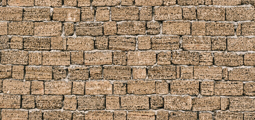 Wall from a handmade brick from shell rock
