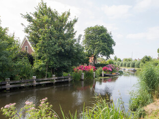 Obraz premium The Angst river flowing through Abcoude, The Netherlands
