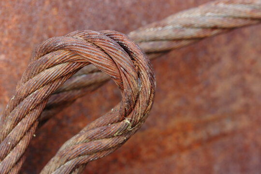 Rusty wire on a background of rusty iron sheet