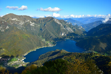 Fototapeta na wymiar Lago di Ledro and its surrounding mountains. Fantastic view from Monte Corno. Trentino, Italy.