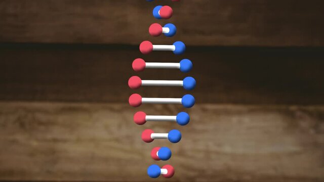 Animation of dna strand spinning over wooden background