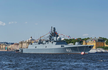 View of warships from the English Embankment of St. Petersburg on the eve of the holiday of the Russian Navy Day.