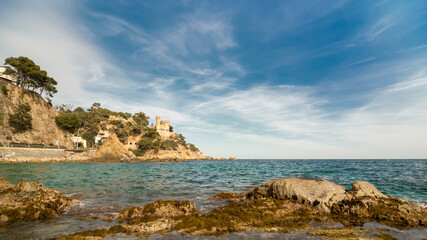 Fototapeta na wymiar Lloret de Mar Castell Plaja at Sa Caleta beach in costa Brava of Catalonia Spain