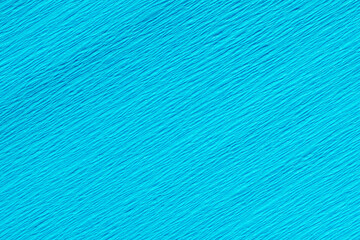 Detail of a turquoise blue crepe paper crinkly texture