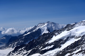 Fototapeta premium Beautiful glacier landscape seen from Jungfraujoch on a sunny summer day. Photo taken July 20th, 2021, Lauterbrunnen, Switzerland.