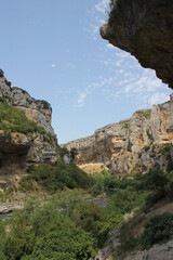 Cliffs of large rocks with vegetation to the Foz de Lumbier to Navarre