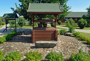 Obraz premium Chapels, gates, bell tower, well and other buildings in the Orthodox hermitage called Skit p.w. Antoni and Teodozjusz Pieczerski near Odrynki in Podlasie, Poland.
