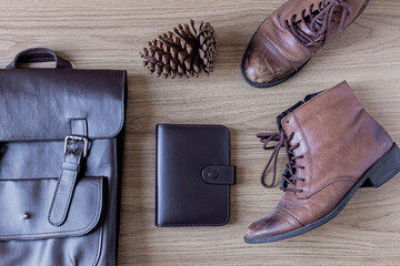 Vintage feminine acessories on a wooden background. Fashion concept.
