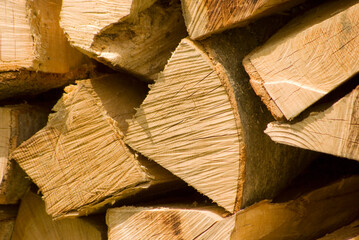textured stacks of firewood for the fire that form textures