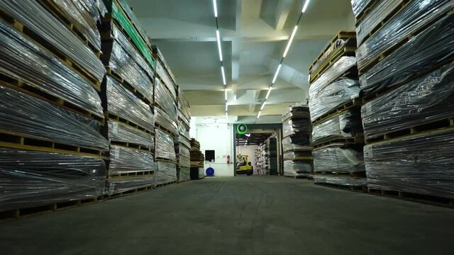 Warehouse with variety of wood for construction and repair. Wood Flooring Factory Production Line