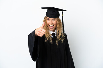Young university graduate isolated on white background with thumbs up because something good has happened