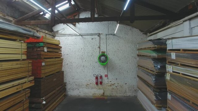 Warehouse with variety of wood for construction and repair. Wood Flooring Factory Production Line