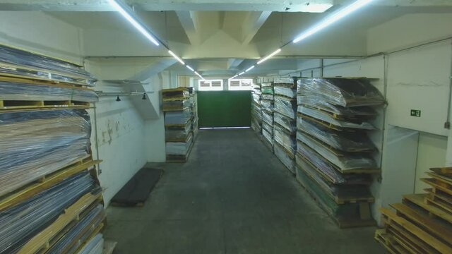 Warehouse with variety of wood for construction and repair. Wood Flooring Factory Production Line