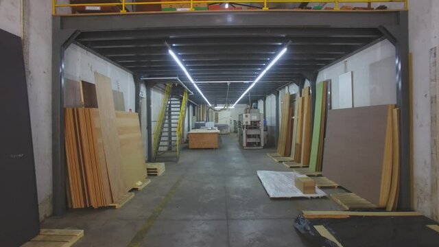 Warehouse with variety of wood for construction and repair. Wood Flooring Factory Production Line