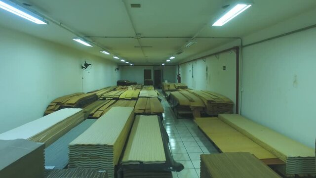 Warehouse with variety of wood for construction and repair. Wood Flooring Factory Production Line