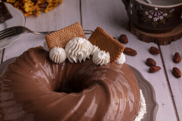 Chocolate and coffee cake with a cup of coffee