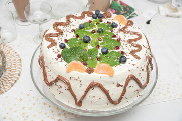 Delicious looking christmas  cake on the table.