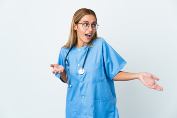 Surgeon doctor woman over isolated white background with surprise expression while looking side