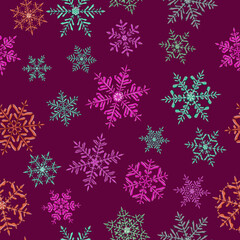 Seamless pattern of complex Christmas snowflakes in various colors on purple background