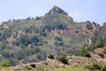 view to abandoned ancient village Gamsutl in the Dagestan from the foot of the mountain