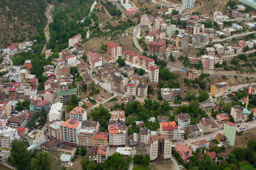 Fototapeta premium Torul, Gumushane, Turkey- June 28 2021: A view of the city center of the Torul district of Gumushane province from above.