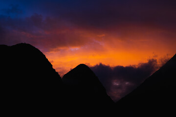 A fiery sunset over volcanos in northern Ecuador