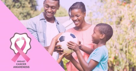 Animation of pink ribbon logo with breast cancer text over smiling family outdoors